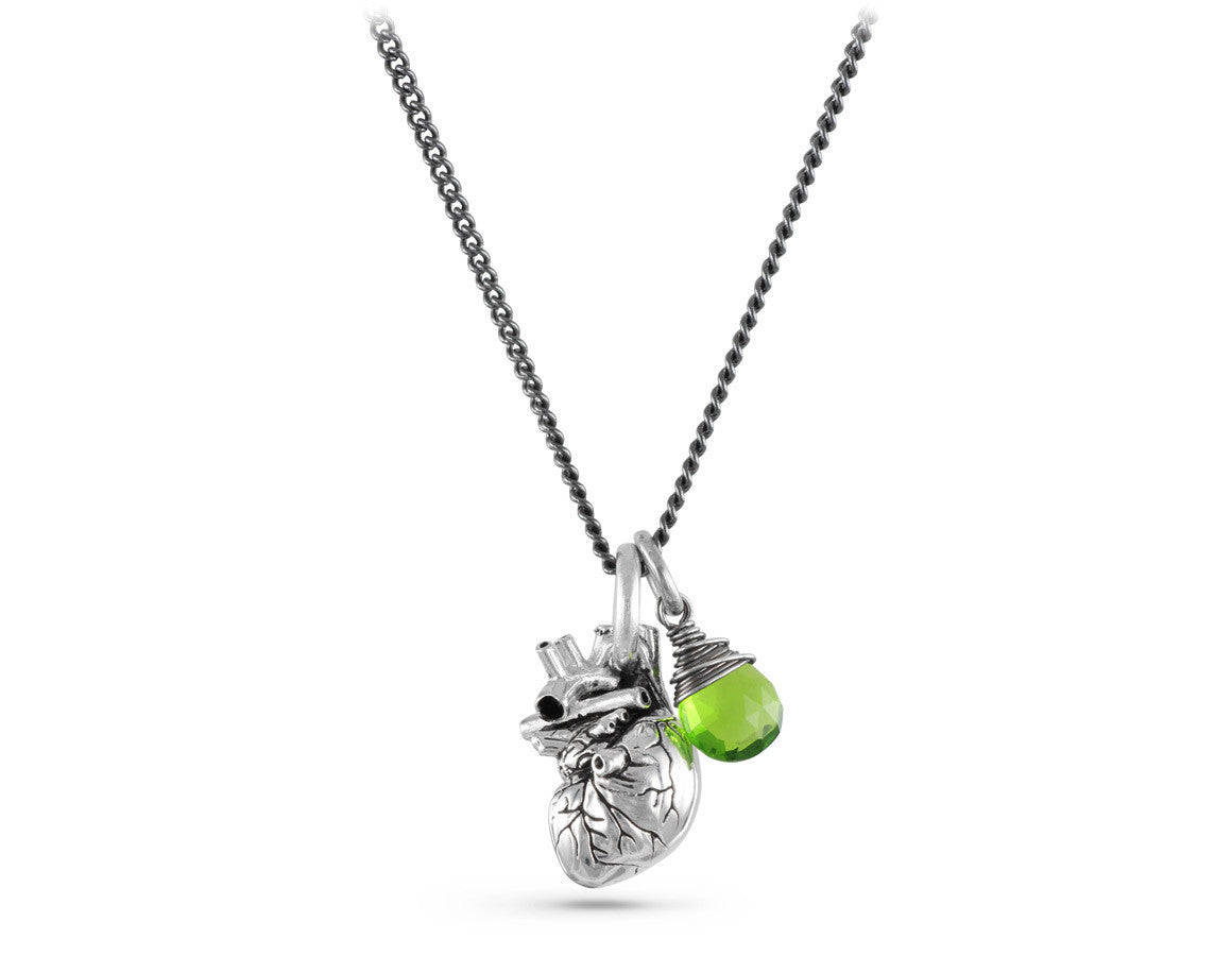 Small Anatomical Heart Necklace with Emerald in Silver - shown on gunmetal chain