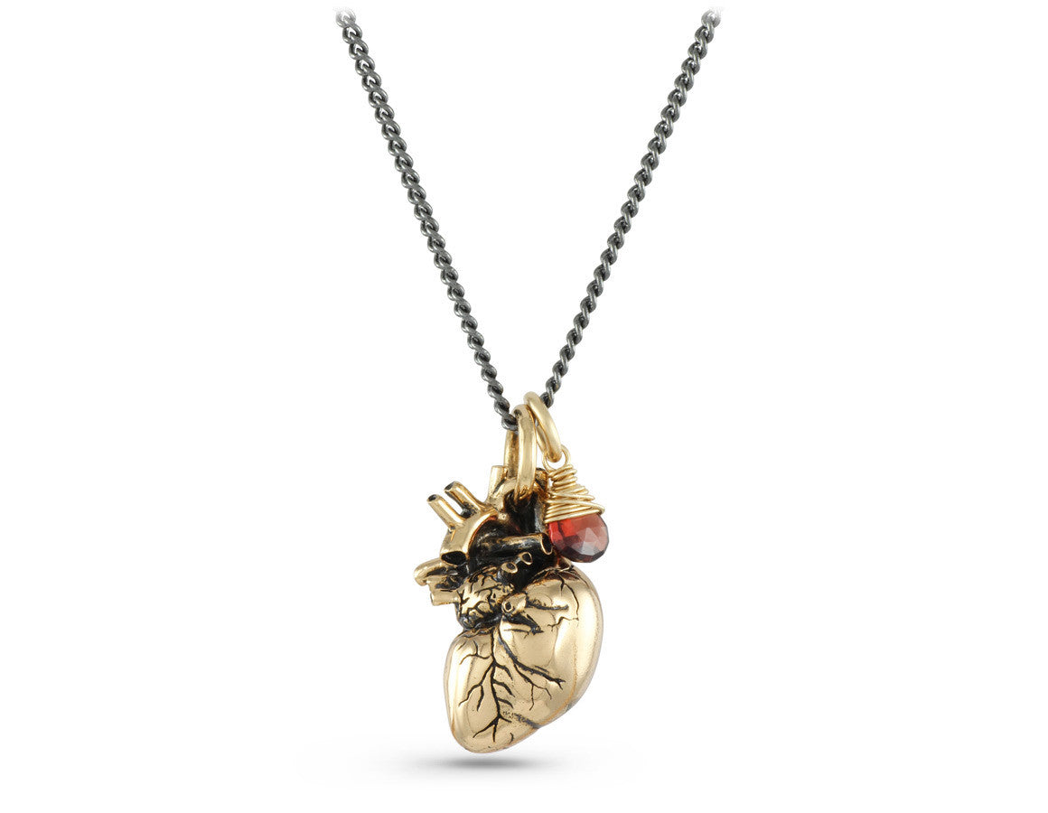 Anatomical Heart Necklace with Garnet in Bronze - shown on gunmetal chain