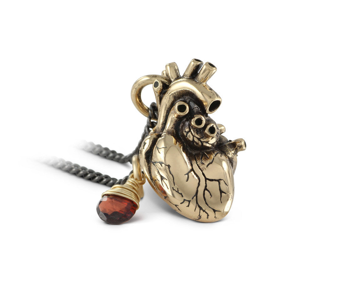 Anatomical Heart Necklace with Garnet in Bronze - shown on gunmetal chain