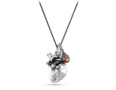 Anatomical Heart Necklace with Garnet in Silver - shown on gunmetal chain