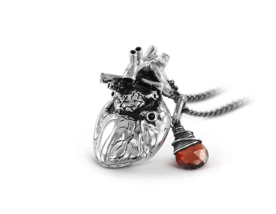 Anatomical Heart Necklace with Garnet in Silver - shown on gunmetal chain