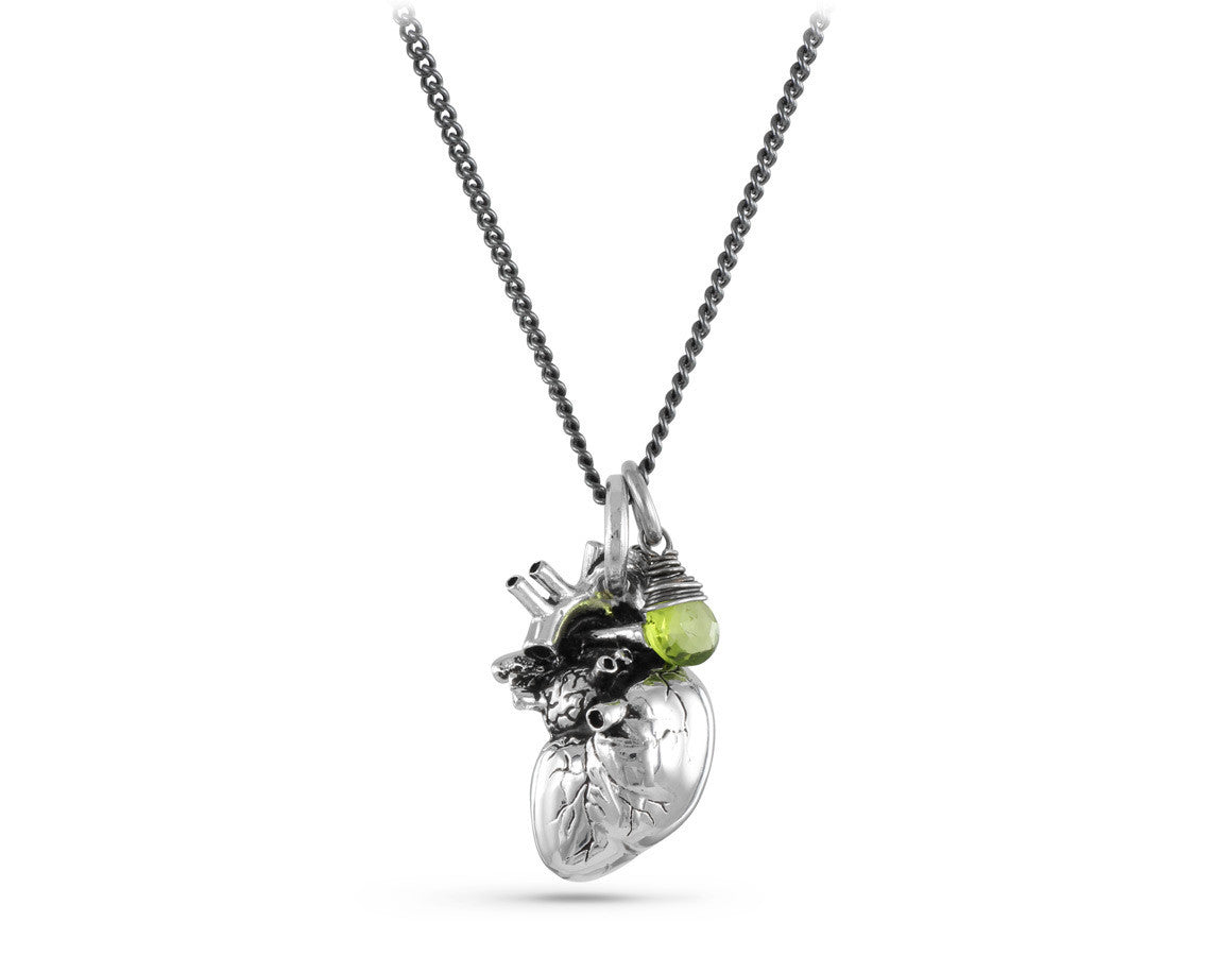 Anatomical Heart Necklace with Peridot in Silver - shown on gunmetal chain