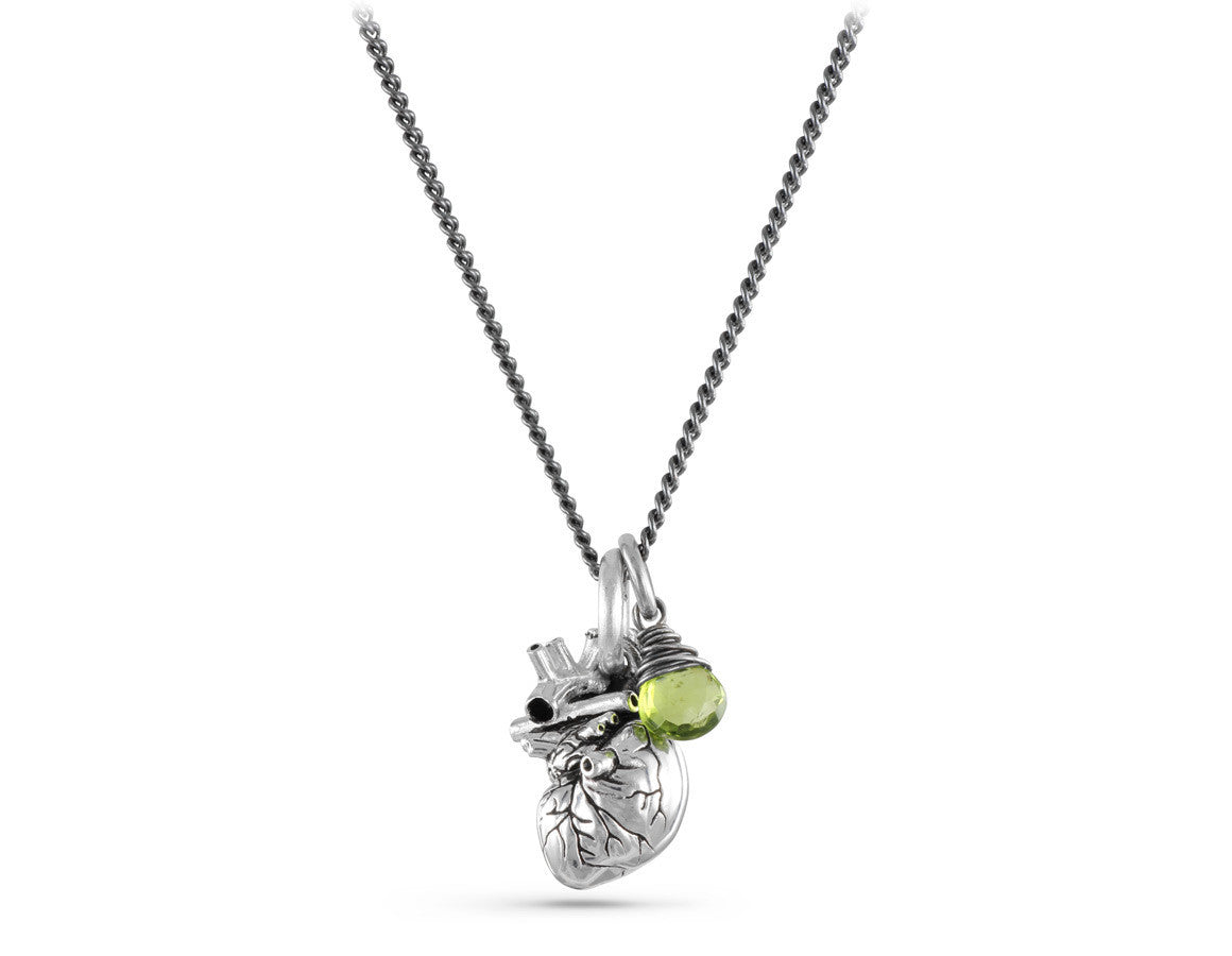 Small Anatomical Heart Necklace with Peridot in Silver - shown on gunmetal chain