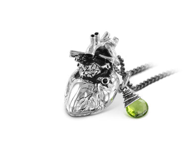 Anatomical Heart Necklace with Peridot in Silver - shown on gunmetal chain