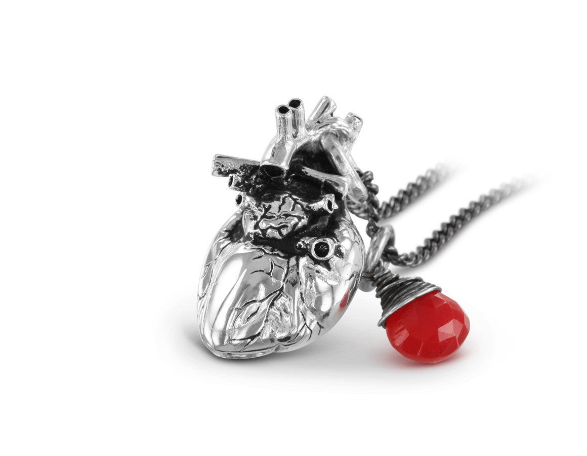 Anatomical Heart Necklace with Ruby in Silver - shown on gunmetal chain