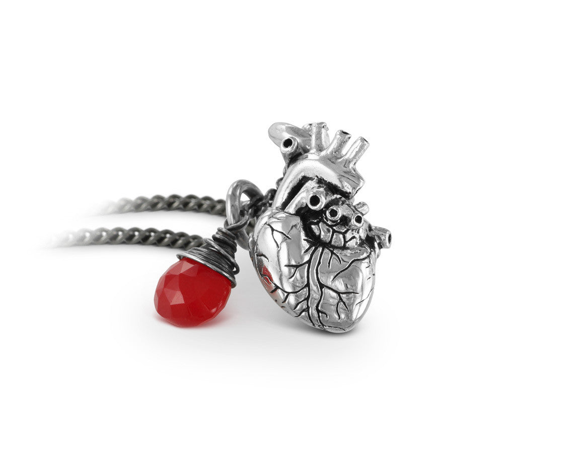 Small Anatomical Heart Necklace with Ruby in Silver - shown on gunmetal chain