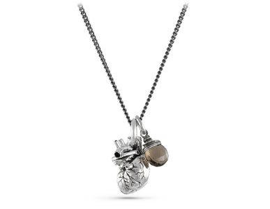 Small Anatomical Heart Necklace with Smokey Quartz in Silver - shown on gunmetal chain