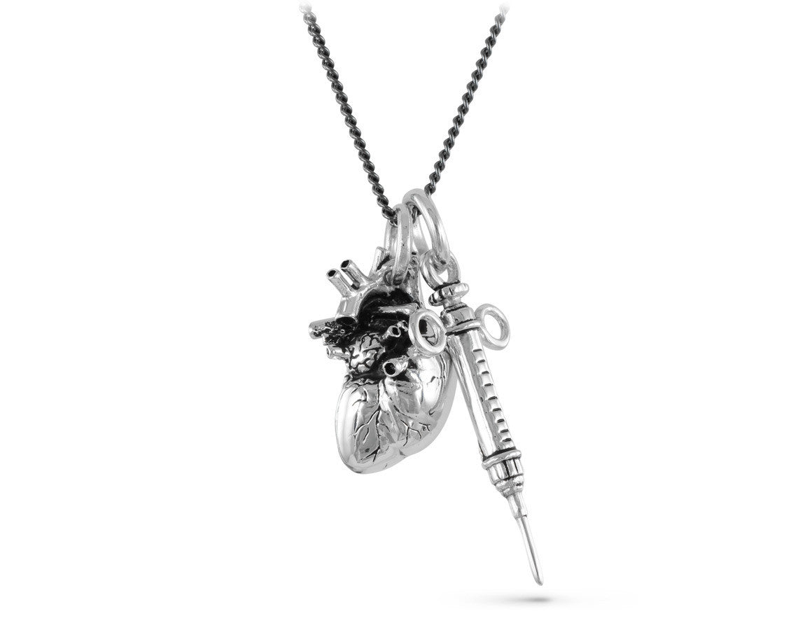 Anatomical Heart & Syringe Necklace in Silver - shown on gunmetal chain