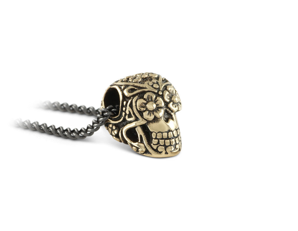 Small Day of the Dead Skull Necklace in Bronze - shown on gunmetal chain