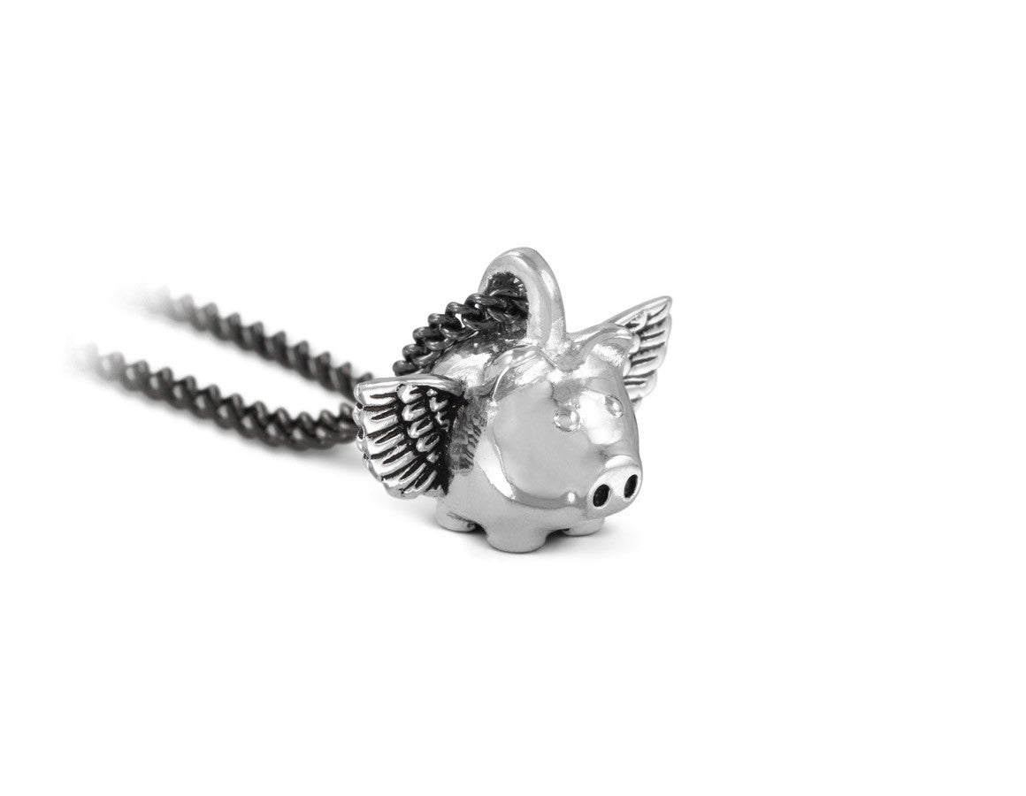 Small Flying Pig Necklace in Silver - shown on gunmetal chain