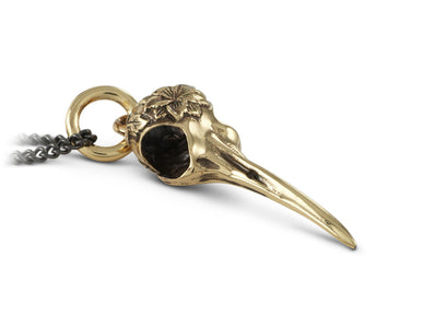 Hummingbird Skull with Flower Necklace in Bronze - shown on gunmetal chain