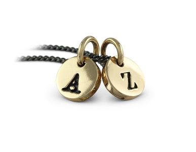 Initial Charm Necklace in Bronze - shown on gunmetal chain