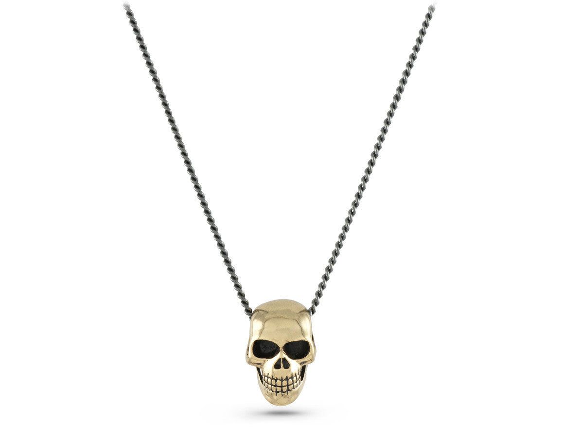 Small Skull Necklace in Bronze - shown on gunmetal chain