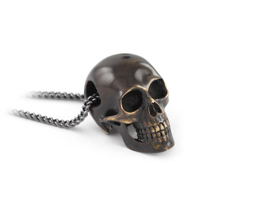 Black Skull Necklace in Bronze - shown on gunmetal chain