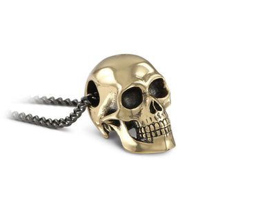 Skull Necklace in Bronze - shown on gunmetal chain