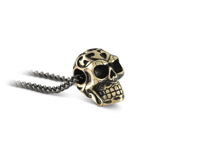 Small Ornate Skull Necklace in Bronze - shown on gunmetal chain