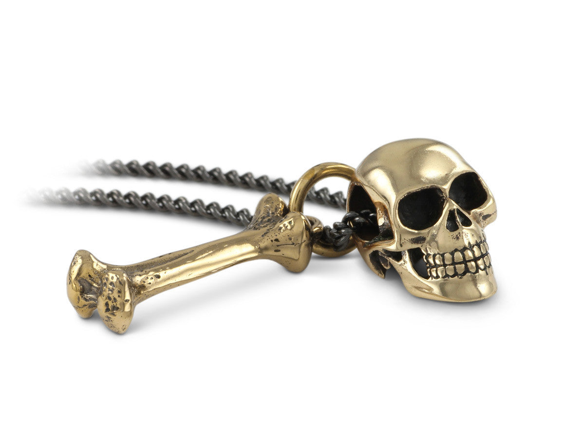 Small Skull & Bone Necklace in Bronze - shown on gunmetal chain