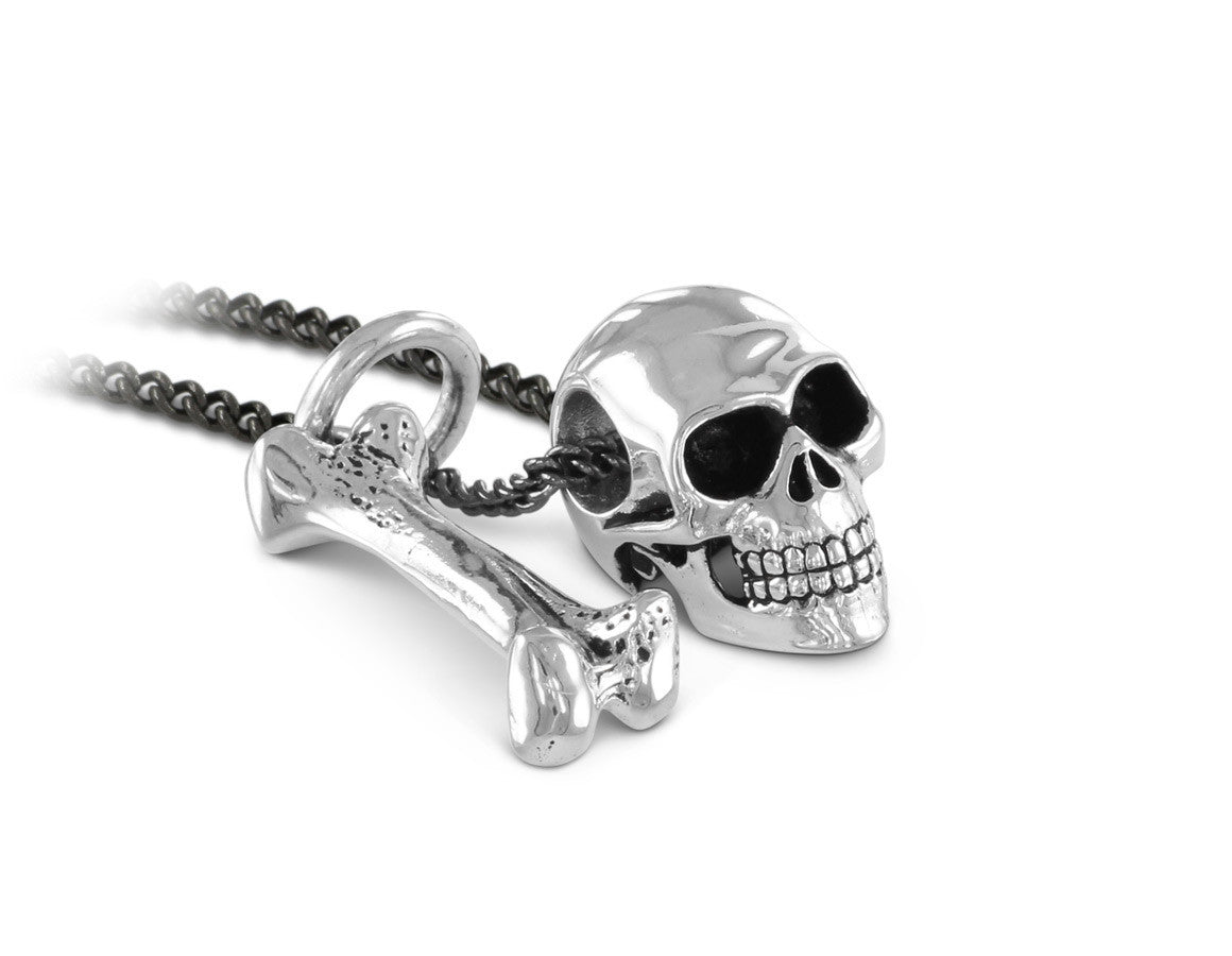 Small Skull & Bone Necklace in Silver - shown on gunmetal chain