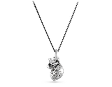 Small Anatomical Heart Necklace in Silver - shown on gunmetal chain