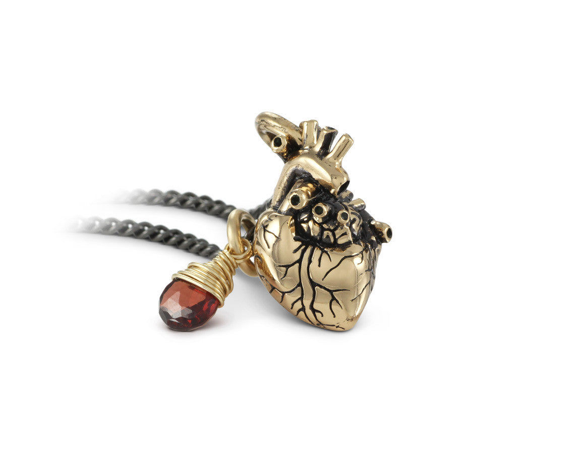 Small Anatomical Heart with Garnet Necklace in Bronze - shown on gunmetal chain