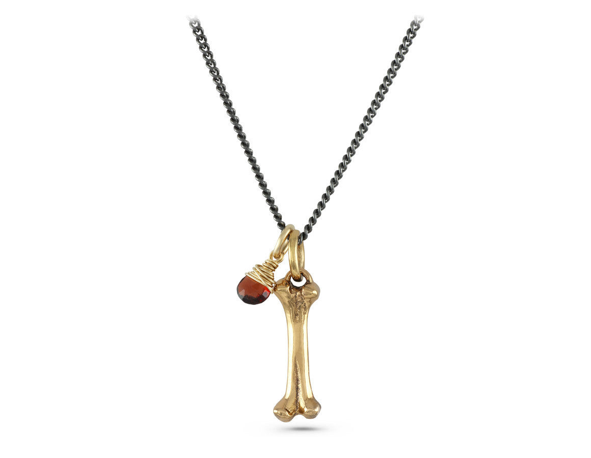 Small Bone Necklace with Garnet in Bronze - shown on gunmetal chain