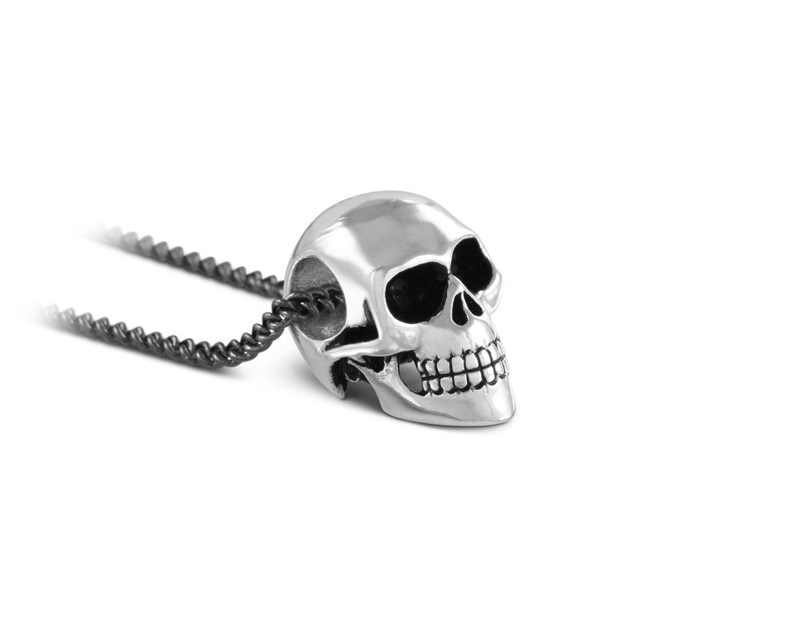 Small Skull Necklace in Silver - shown on gunmetal chain