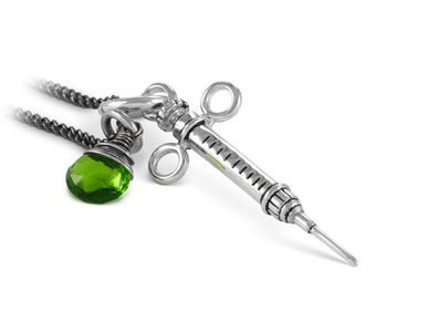 Syringe Necklace with Emerald in Silver - shown on gunmetal chain