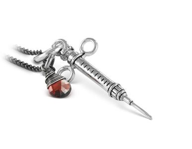 Syringe Necklace with Garnet in Silver - shown on gunmetal chain