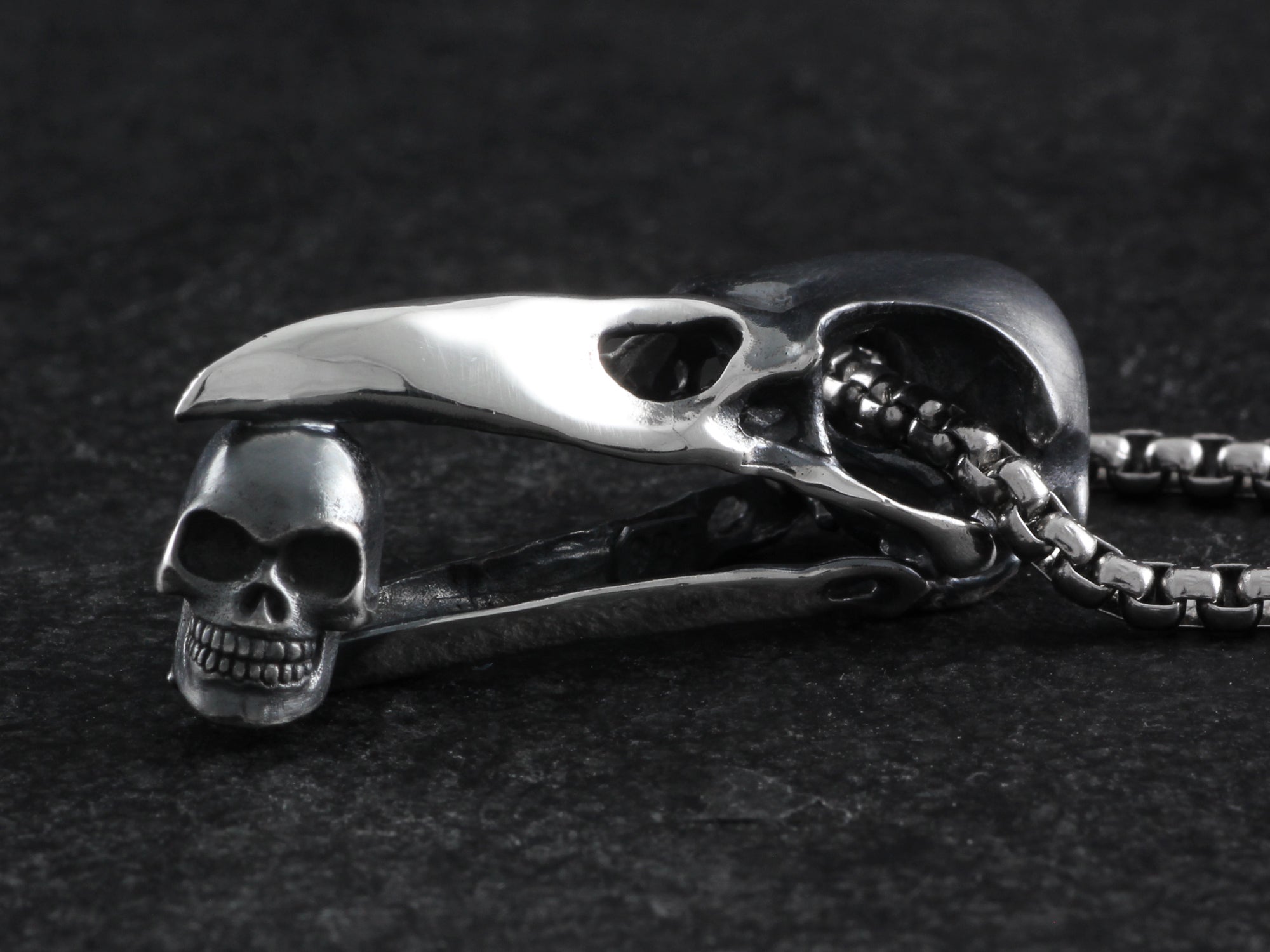 Sterling Silver Raven Skull with Human Skull Necklace