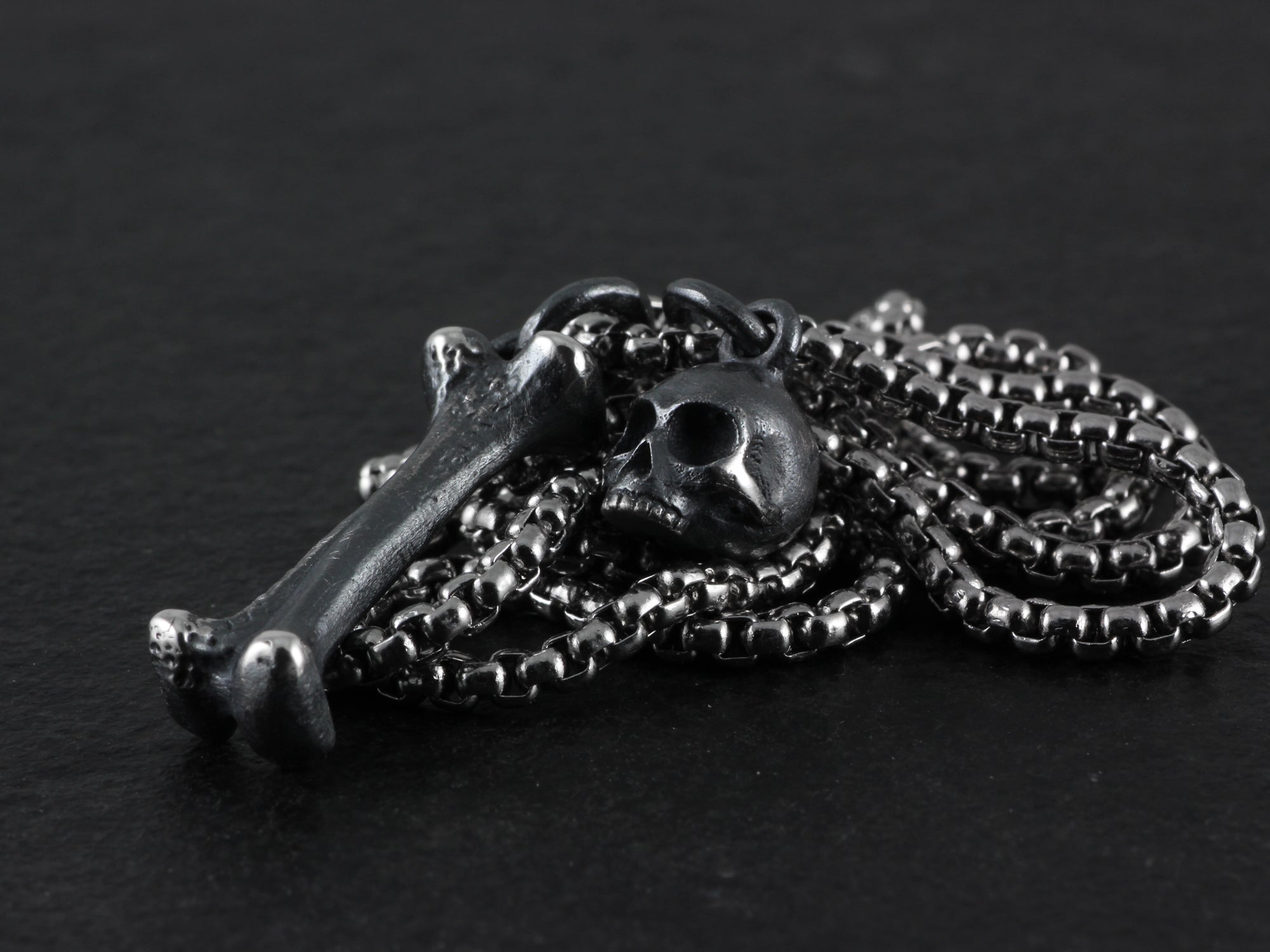 Sterling Silver Tiny Skull & Bone Necklace